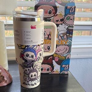 Stanley Cream Travel Mug with Colorful Characters